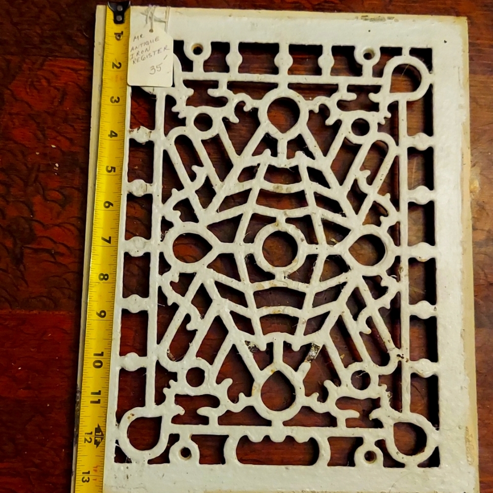 Antique iron register grate